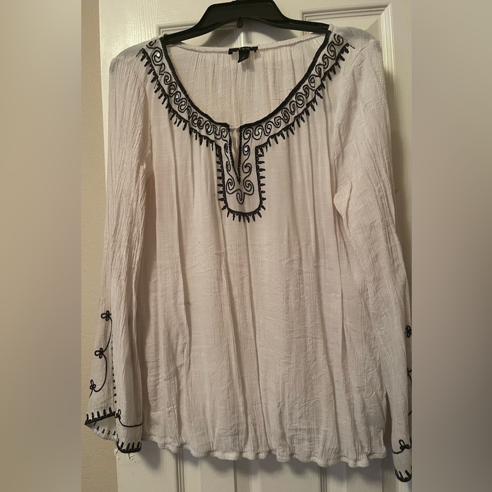 Off white blouse/black trim